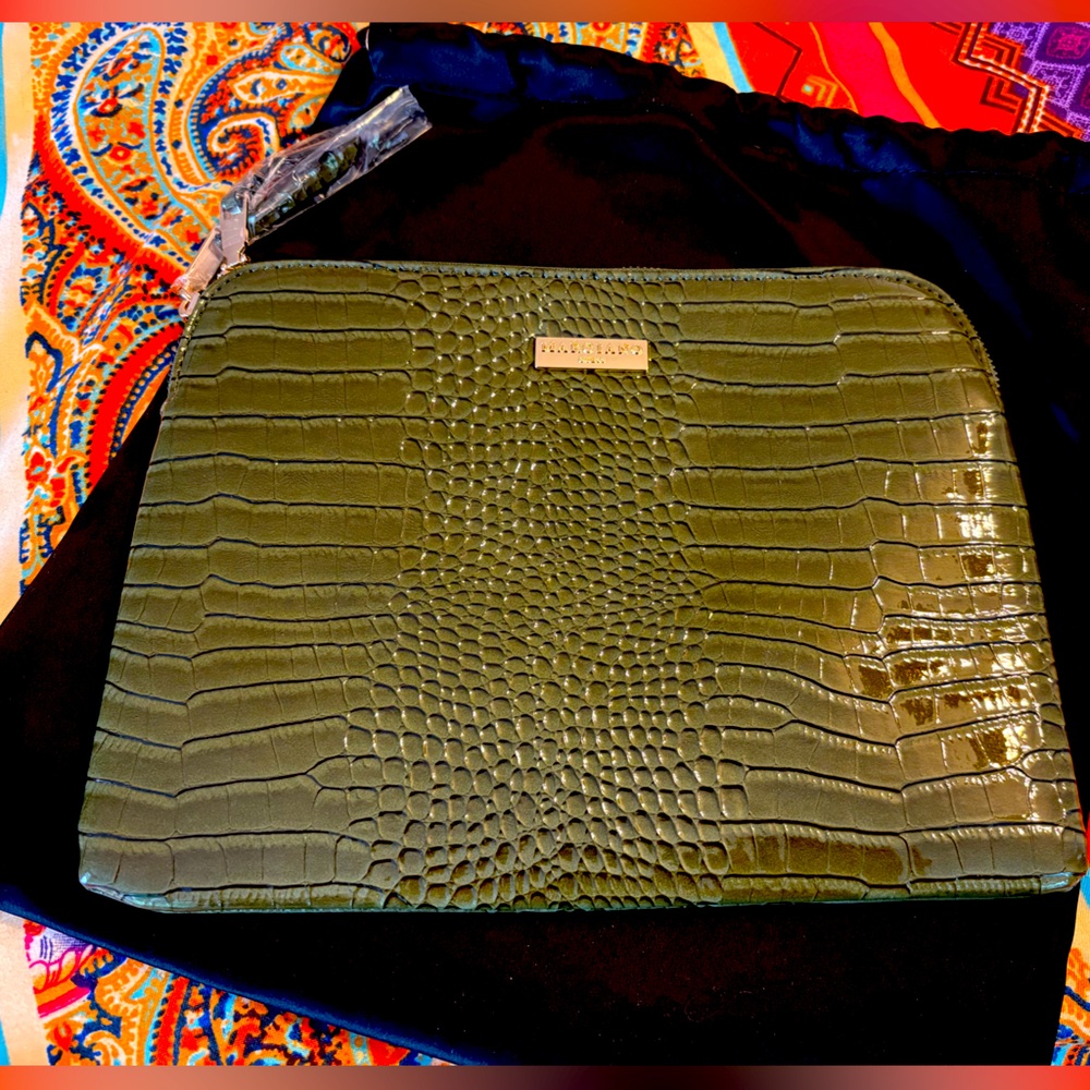 Guess Marciano Faux snake skin clutch. NWT